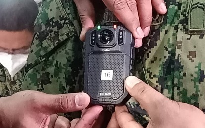 <p><strong>ACCOUNTABILITY TOOL.</strong> The Philippine National Police will distribute body cameras to stations nationwide by the end of March. On Tuesday (March 16, 2021), the Supreme Court said it is also considering requiring the mandatory use of body cameras for law enforcement officers serving court warrants. <em>(Photo courtesy of PTV)</em></p>