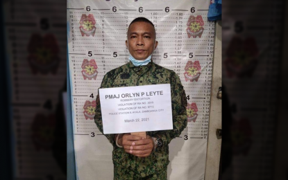 <p><strong>NABBED.</strong> Maj. Orlyn Leyte, officer in charge of the Zamboanga City Police Office’s (ZCPO) Station 9, was arrested along with four other police officers for extortion in an entrapment operation on Monday (March 22, 2021). The operation stemmed from a complaint of a businesswoman who complained that she was robbed of jewelry and a week's worth of her store earnings by Leyte and his men in the guise of an anti-drug operation on March 11. <em>(Photo courtesy of PNP)</em></p>