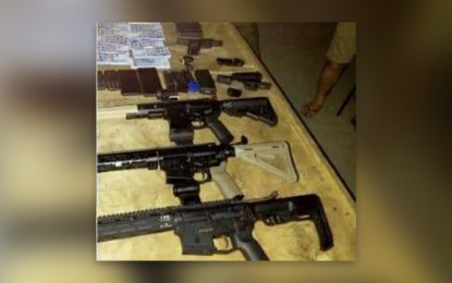 <p><strong>GUN SMUGGLING.</strong> Lt. Gen. Corleto Vinluan Jr., Western Mindanao Command (Westmincom) chief, declares Wednesday (March 24, 2021) that any illegal activity by its personnel will not be tolerated. In photo are the firearms and other pieces of evidence seized from the suspects.<em> (Photo courtesy of Westmincom Public Information Office)</em></p>