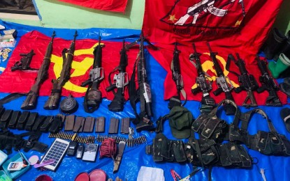<p><strong>ARMS CACHE</strong>. Soldiers from the 62nd Infantry Battalion of the Philippine Army seized high-powered weapons, explosives, and other items during an encounter with suspected New People's Army rebels in Barangay Trinidad, Guihulngan City, Negros Oriental on Tuesday afternoon (March 23, 2021). Eight suspected rebels died in the clash. <em>(Photo courtesy of the Philippine Army)</em></p>