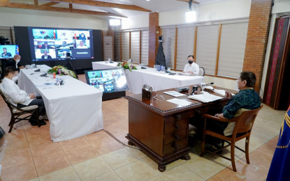 <p><strong>PANDEMIC RESPONSE EXECS.</strong> President Rodrigo Roa Duterte presides over a meeting with the Inter-Agency Task Force on the Emerging Infectious Diseases (IATF-EID) core members prior to his talk to the people at the Malago Clubhouse in Malacañang Park, Manila on Wednesday (March 24, 2021). Duterte defended his appointment of retired military officials as the government’s pandemic response managers, saying one does not necessarily need to be a medical professional to effectively secure deals to purchase Covid-19 vaccines. <em>(Presidential photo by King Rodriguez)</em></p>