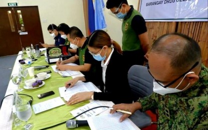 <p><strong>DELIBERATION</strong>. Western Visayas Regional Oversight Committee on Dangerous Drugs deliberates on the application of 84 barangays in the region and declared 51 cleared from illegal drugs on March 22, 2021. Currently, 82.25 percent of the region’s 4,051 barangays have been cleared of illegal drugs. <em>(PNA photo by PDEA 6)</em></p>