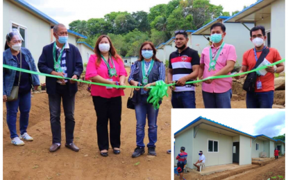<p><strong>HOUSING PROJECT.</strong> The ceremonial ribbon cutting for the PHP25-million housing project Barangay Perez in Kidapawan City on Saturday (March 27, 2021) attended by (from right) Jimmy Sta. Cruz of the city information office, Councilor Peter Salac, IP representative Datu Radin Igwas, NHA-12 Manager Engr. Erasme G. Madlos, and DHSUD-12 Director Jennifer C. Bretana, among others. The 50 housing units were awarded to 50 IP families whose houses were damaged by the 2019 succession of strong quake that hit the city and the rest of North Cotabato province. <em>(Photo courtesy of Kidapawan CIO)</em></p>