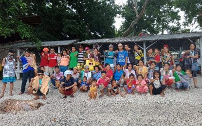 <p><strong>FAMILY REINTEGRATION.</strong> The 13 Indigenous Peoples minors from Davao del Norte, after their rescue in Cebu City in February from an alleged New People’s Army training, join their families in a reintegration program in Mabini, Davao de Oro on March 19. They will undergo skills training before they return to their communities.<em> (Photo courtesy of PRO-11)</em></p>