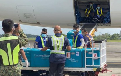 <p><strong>MORE JABS HAVE ARRIVED</strong>. A total of 7,200 vials of the Sinovac vaccines arrive at the Iloilo airport on Tuesday (March 30, 2021). They will be distributed to provinces and highly urbanized cities for the inoculation of their frontline health workers.<em> (Photo courtesy of the Regional Vaccination Operations Center)</em></p>
