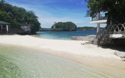 <p><strong>ACCEPTING VISITORS</strong>. Quezon Island at Hundred Islands National Park (HINP) in Alaminos City, Pangasinan.  HINP is open to tourists this Holy Week except those from areas under enhanced community quarantine, City Tourism Officer Miguel Sison said on Tuesday (March 30, 2021). <em>(PNA File Photo)</em></p>