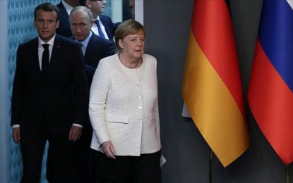 Putin, Merkel, Macron hold trilateral consultations