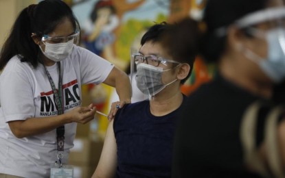 <p><strong>MORE PINOYS PROTECTED.</strong><em> </em>A man gets his first dose of a Covid-19 vaccine in this undated photo. As of May 25, a total of 4,495,375 Filipinos have received at least one dose of the Covid-19 vaccine, 1,029,061 of them now fully protected.<em> (PNA photo by Avito Dalan)</em></p>