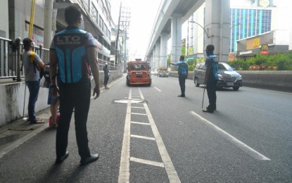 <p><strong>REDUCED CASES.</strong> Aurora Boulevard in Cubao, Quezon City is nearly deserted on Maundy Thursday (April 1, 2021). OCTA Research reports that the average new daily Covid-19 infections and the infection growth rate in NCR Plus dropped following the implementation of enhanced community quarantine. <em>(PNA photo by Robert Oswald P. Alfiler)</em></p>