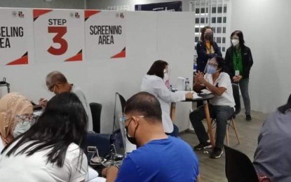 <p><strong>JABS SITE.</strong> Taguig’s Mega Vaccination Hub in Lakeshore, Barangay Lower Bicutan resumes vaccination for senior citizens and persons with comorbidities on Saturday (April 3, 2021). Mayor Lino Cayetano says they aim to provide free vaccines for the city’s 1 million residents. <em>(Photo courtesy of Taguig-PIO)</em></p>