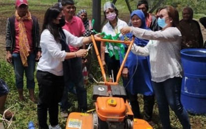 <p><strong>WOMEN’S GROUP EMPOWERMENT.</strong> Muslim women coop members in Alamada, North Cotabato are expected to be more productive with the livelihood aid extended to them amid the pandemic by DAR-North Cotabato amid the pandemic on Monday (April 5, 2021). The DAR provincial office also extended help to a women’s group in Magpet town of the same province to be resilient amid calamities and economic difficulties.<em> (Photo courtesy of DAR-NoCot)</em></p>