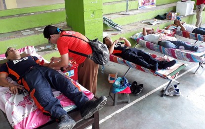 <p><strong>PLASMA NEEDED.</strong> The Philippine Red Cross is at the forefront of blood donation drives, like in this undated photo that shows firefighters participating in a bloodletting activity. The humanitarian organization is also appealing for plasma donors to help Covid-infected patients. <em>(Photo courtesy of PRC)</em></p>