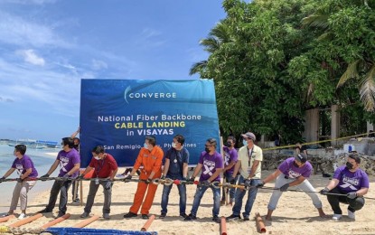 <p><strong>CABLE-LAYING</strong>. This photo shared by Converge ICT chief executive officer Dennis Anthony Uy shows the landing of the company’s fiber cables in Cebu’s northernmost town of San Remigio. The publicly listed telecommunication firm is set to launch its commercial fiber broadband services in Visayas and Mindanao by the second quarter of this year. <em>(Photo courtesy of Dennis Anthony Uy)</em></p>