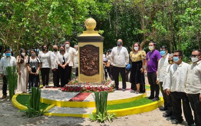<p><strong>HISTORICAL MARKER</strong>. Officials stand next to the newly-unveiled quincentennial marker in Canigao Islet in Matalom, Leyte during the unveiling on Monday (April 5, 2021). The National Quincentennial Committee has unveiled more historical markers in Leyte Island to raise public awareness on the significance of several places to the first circumnavigation of the world, the tourism department said on Tuesday (April 6, 2021).<em> (Photo courtesy of Department of Tourism Region 8)</em></p>
