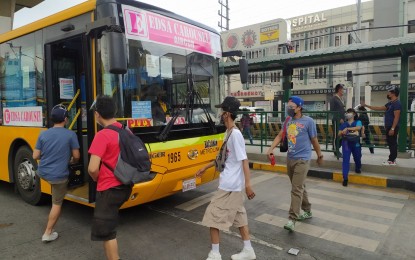 <p>A bus collecting passengers at one of the stations along the EDSA Busway. (<em>Photo courtesy of DOTr</em>) </p>