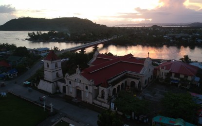 <p><strong>FLOOD CONTROL</strong>. The Balangiga River behind the town's church in this March 25, 2021 photo. At least PHP57.77 million worth of flood control projects have started along the town's major river to address the perennial flooding problem in the area. <em>(Photo courtesy of Balangiga Cycling Club)</em></p>