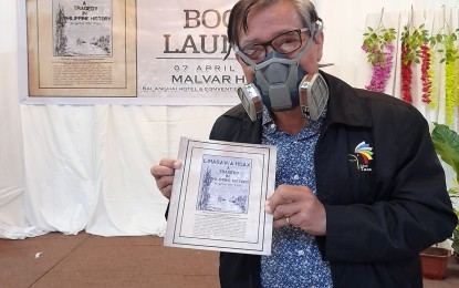 <p><strong>ADVOCATE’S BOOK.</strong> Dr. Potenciano R. Malvar, a local historian, launched his book “Beyond the Pale: Limasawa Hoax, A Tragedy in Philippine History” Wednesday (April 7, 2021) that outlines his studies and research to support the claim that the first Catholic mass in 1521 was celebrated in Butuan. <em>(PNA photo by Alexander Lopez)</em></p>