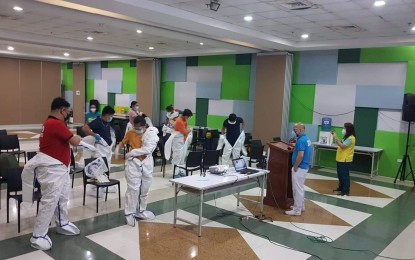 <p><strong>REINFORCEMENT.</strong> Tondo Medical Center personnel in Manila orient healthcare workers from the Visayas in this undated photo. The Department of Health said Thursday (April 8, 2021) 136 doctors and nurses from other regions will augment Metro Manila hospitals. <em>(Photo from DOH)</em></p>