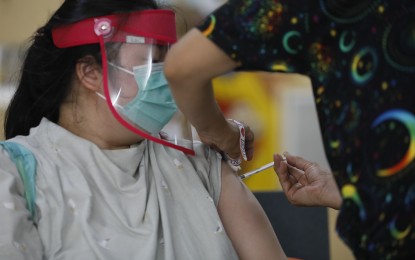 <p><strong>MASS VACCINATION.</strong> Vaccination, like in this photo taken April 1, 2021 at Justo Lukban Elementary School in Paco, Manila, is the best defense against Covid-19. The World Health Organization reported on Thursday (April 8, 2021) that Covid-19 cases worldwide have reached 132 million. <em>(PNA photo by Avito C. Dalan</em>)</p>