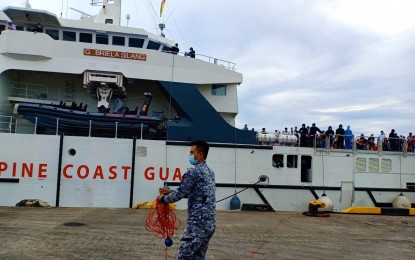 <p><strong>MARITIME PATROL.</strong> The BRP Gabriela Silang, shown in this July 2020 photo assisting stranded passengers in Tagbilaran, will be among the five Philippine Coast Guard ships that will participate in Task Force Pagsasanay. The training will include navigation along restricted waterways, night navigation, firefighting, and basic life support.  <em>(Photo courtesy of BFP-Tagbilaran)</em></p>