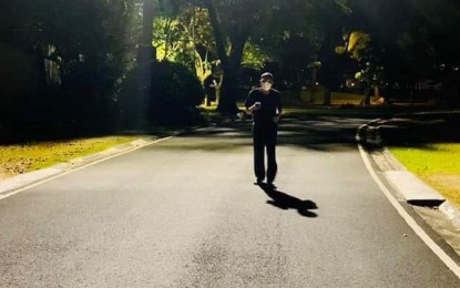 <p><strong>STAYING HEALTHY</strong>. President Rodrigo Duterte jogs on Friday evening (April 9, 2021) to prove to the public that he is doing well. His photos were uploaded on the Facebook page of Senator Christopher Lawrence Go following speculation the 76-year-old President is sick. <em>(Photo courtesy of Senator Bong Go)</em></p>