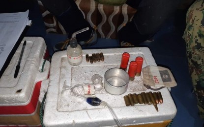 <p><strong>EVIDENCE</strong>. Photo shows the 17 assorted bullets and drug paraphernalia seized by police operatives from suspected drug pusher Roger Sarco, 38, in a raid early Saturday (April 10, 2021) at his home in Malesido Homes, Barangay San Isidro in General Santos City. The suspect is listed as a known pusher and included in the city’s drug watchlist. <em>(Photo courtesy of city Police Station No. 4)</em></p>