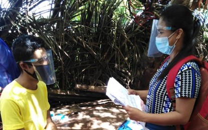 <p><strong>NATIONAL ID.</strong> A Philippine Statistics Authority employee (right) interviews a registrant in Antique province in 2020. More than 28 million Filipinos have taken the first step in the Philippine Identification System that will provide a single ID card as valid proof of identity for government and private transactions. <em>(Photo courtesy of PSA)</em></p>