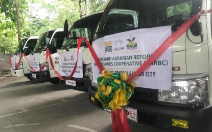 <p><strong>FARM AID</strong>. Photo shows four of the seven hauling trucks and other inputs worth some PHP63.4 million that were turned over by the Department of Agrarian Reform, led by Secretary John Castriciones, on Tuesday and Wednesday (April 14, 2021) to agrarian reform beneficiaries in parts of Region 12 (Soccksargen). Castriciones, who is on a three-day swing in the region, also spearheaded the distribution of a total of 2,921 Certificate of Land Ownership Awards to 3,541 ARBs. (<em>PNA photo by Richelyn Gubalani</em>)  </p>