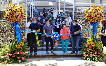<p><strong>MEGA FACILITY.</strong> Government officials officially open the Temporary Treatment and Monitoring Facility (TTMF) in the Manila Times College of Subic at the Subic Bay Freeport Zone in Zambales on Wednesday (April 14, 2021). (From left) Health Undersecretary Leopoldo Vega, Testing czar Vince Dizon, and Health Assistant Secretary Ma. Francia Laxamana led the ceremony. <em>(Screenshot from RTVM)</em></p>