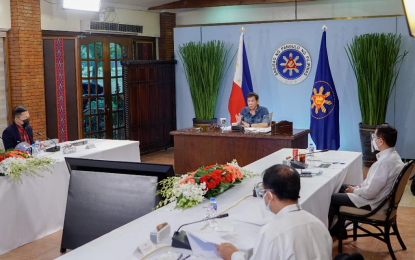 <p><strong>TALK TO THE PEOPLE.</strong> President Rodrigo R. Duterte presides over a meeting with the Inter-Agency Task Force on the Emerging Infectious Diseases (IATF-EID) core members before his talk to the people at the Malago Clubhouse in Malacañang Park, Manila on April 12, 2021. Duterte is set to hold another talk to the people on Wednesday (April 15). <em>(Presidential photo by King Rodriguez)</em></p>