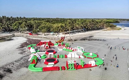 <p><strong>WATERPARK</strong>. The Inflatable Waterpark Adventure is the newest attraction in the town of Anda, Pangasinan. The waterpark added color to the white sand beach in Tondol town.<em> (Photo courtesy of Anda Pangasinan by Joganie Rarang's Facebook page)</em></p>