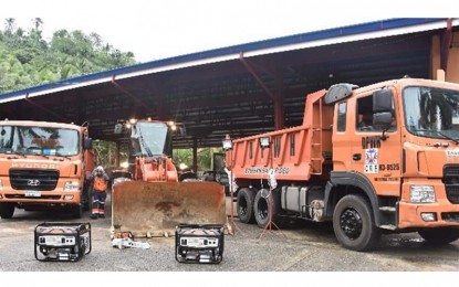 <p><strong>BRACING FOR 'BISING'</strong>. Some of the equipment readied by the Department of Public Works and Highways (DPWH) 8 (Eastern Visayas) in Palo, Leyte on Saturday (April 17, 2021). The DPWH-8 said hundreds of personnel were in strategic locations, bracing for Typhoon Bising's impact.<em> (Photo courtesy of DPWH)</em></p>