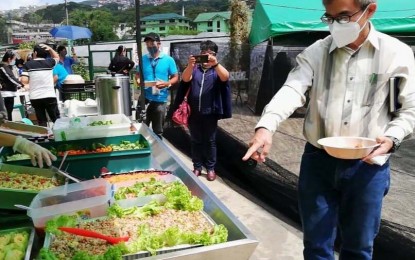 <p><strong>VEGGIE BUFFET</strong>. The Department of Agriculture in the Cordillera came up with an 'eat-all-you-can' activity at the Bureau of Plant Industry compound in Baguio City as part of the High Value Crop Week from April 12-16 which coincided with the Filipino Food Month celebration. A total of 20 different food preparations using vegetables were served to attendees who paid for a PHP100 meal ticket each.<em> (PNA photo by Liza T. Agoot)</em></p>
