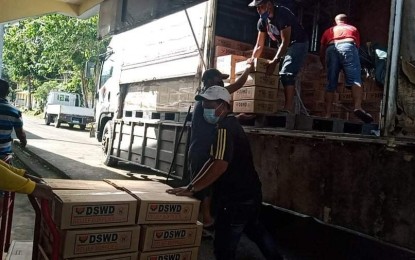 <p><strong>FAMILY FOOD PACKS.</strong> A total of 3,300 food boxes are stored in strategic locations across Eastern Visayas on Monday (April 19, 2021). These are on top of the 11,694 food packs stored in the Regional Resource Operations Center in Palo, Leyte, according to the Department of Social Welfare and Development. <em>(Photo courtesy of DSWD-EV)</em></p>