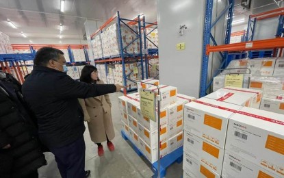 <p><strong>FOR SHIPMENT.</strong> A team from the Philippine Embassy in Beijing, led by First Secretary Winston Almeda and Economic Section Attache Dada Katrina Aromin, inspects the shipment of 500,000 doses of CoronaVac on Monday (April 19, 2021). The vaccines will be delivered on April 22, 2021. <em>(Photo courtesy of Philippine Ambassador Jose Santiago Sta. Romana)</em></p>