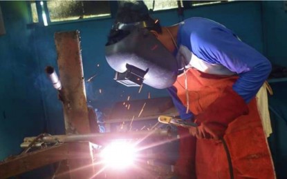 <p><strong>SKILLS TRAINING.</strong> A vocational scholar of the Bangsamoro Autonomous Region in Muslim Mindanao Technical and Vocational Education and Training program hones his welding skills for the completion of his scholarship course. At least 3,453 MBHTE-BARMM scholars under the Technical and Vocational Education and Training program successfully graduated from their courses during the first quarter of this year.<em> (File photo courtesy of MBHTE-BARMM)</em></p>