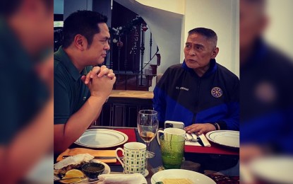 <p><strong>MAN OF SERVICE</strong>. Undated photo shows Communications Secretary Martin Andanar (left) chatting with his father, special envoy to Malaysia Wencelito Andanar who died of liver cancer on Thursday morning (April 22, 2021). The younger Andanar described his father as a “man of service” and “the greatest man and mentor” he has ever known. <em>(Contributed photo)</em></p>