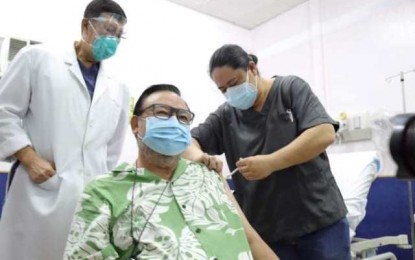 <p><strong>VACCINATED</strong>. Iloilo City Mayor Jerry P. Treñas receives his first dose of Sinovac at the West Visayas State University Medical Center in Iloilo City on Thursday (April 22, 2021). He said he volunteered to be vaccinated to encourage more people to get inoculated.<em> (PNA photo courtesy of Jerry Treñas’ FB page)</em></p>