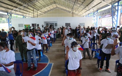 <p><strong>STARTING A NEW LIFE.</strong> At least 84 underground supporters of the communist movement pledge their allegiance to the government in a ceremony in Antipolo City, Rizal on Friday (April 23, 2021). PNP chief, Gen. Debold Sinas, said this is another victory of the government against the communist terrorist groups. <em>(Photo courtesy of PNP-PIO)</em></p>