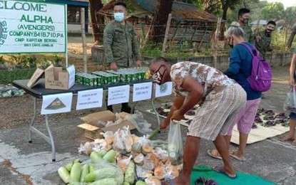 <p><strong>ARMY EFFORT.</strong> The Philippine Army’s 84th Infantry Battalion and private donors set up a community pantry in Camp Kapitan Berong, Guimba on Saturday (April 24, 2021). The leadership of the Armed Forces of the Philippines supports community pantries and similar activities. <em>(Photo courtesy of 84IB)</em></p>