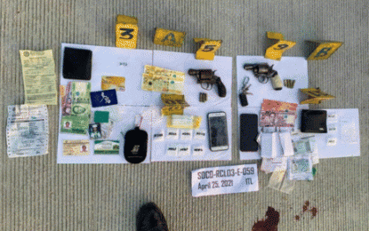 <p><strong>EVIDENCE</strong>. The evidence recovered from two drug suspects who were killed in a shootout with police in Santa Rosa, Nueva Ecija on Sunday (April 25, 2021). The duo fought it out with lawmen during a buy-bust operation in Barangay Soledad around 3:25 a.m.<em> (Photo courtesy of NEPPO)</em></p>