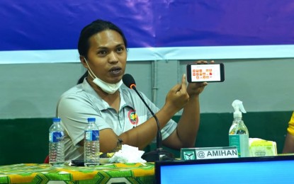 <p><strong>ACT OF TREASON</strong>. Joy James Saguino alias 'Ka Amihan',  former secretary of Guerilla Front 20 under Sub-regional Committee 1 of the New People’s Army’s Southern Mindanao Region, says defunding NTF ELCAC will deprive a development program that rebel returnees deserve. In a recent press conference in Magpet, Cotabato, Ka Amihan said (lawmakers’ move to defund or realign the National Task Force to End Local Communist Armed Conflict’s (NTF-ELCAC) funds an act of treason. (<em>Army’s 1002nd Brigade photo</em>)</p>
