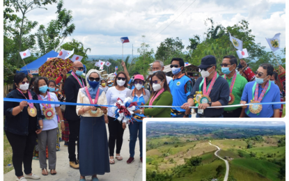 <p><strong>FARMERS’ ROAD PROJECT.</strong> DAR Undersecretary Ranibai Dilangalen (third from left) and Bagumbayan Mayor Jonalette Y. de Pedro lead the ribbon cutting for the opening of an 8,9-kilometer farm-to-market road built under the Mindanao Sustainable Agrarian and Agriculture Development project in Bagumbayan, Sultan Kudarat on Tuesday (April 27, 2021). The PHP55.7-million project connects Barangay Sumilil in Bagumbayan to adjacent Barangay Ned in Lake Sebu, South Cotabato.<em> (Photo courtesy of DAR-12)</em></p>
<p><em> </em></p>