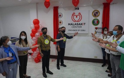 <p><strong>103rd MALASAKIT CENTER</strong>. Sen. Christopher Lawrence "Bong" Go (fourth from left) leads other government officials in opening the 103rd Malasakit Center in the country and the 6th in Cebu, at the Carcar Provincial Hospial in Carcar City, Cebu on Tuesday (April 27, 2021). Other officials who graced the launching of the one-stop-shop for medical aid processing were Presidential Assistant for the Visayas Secretary Michael Lloyd Dino (third from left), Carcar City Mayor Mercedita Apura (second from left), and Gov. Gwendolyn Garcia (third from right)<em>. (Photo courtesy of OPAV)</em></p>