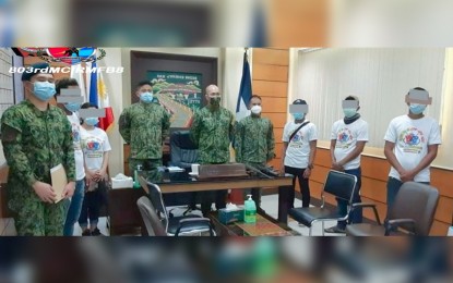 <p><strong>DWINDLING NUMBERS</strong>. The five New People's Army  (NPA) members presented to key regional officials of the Philippine National Police (PNP) on Wednesday (April 28, 2021). The surrender of the rebels in Northern Samar and Leyte provinces to policemen indicates a dwindling strength of the communist terrorist group in Eastern Visayas. <em>(Photo courtesy of PNP)</em></p>
