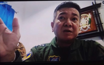 <p><strong>HIGH MORALE.</strong> Col. Antonio Francisco, chief of the command staff of the Air Mobility Command of the Philippine Air Force based in Mactan-Brigadier General Benito Ebuen Air Base in Lapu-Lapu City, Cebu, issues a statement dismissing as fake news the social media post claiming Sen. Christopher Lawrence "Bong" Go's alleged photo opportunity with airmen injured in the chopper crash in Getafe, Bohol on April 27, 2021. Francisco said the spontaneous and chance meeting with Sen. Go boosted the morale of the survivors of the chopper crash. <em>(Screengrab from PTV video)</em></p>