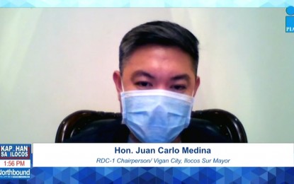 <p><strong>CURBING INSURGENCY.</strong> Vigan City Mayor Juan Carlo Medina, Regional Development Council in the Ilocos Region chairperson, speaks during the Kapihan ed Ilocos hosted by the Philippine Information Agency on Thursday (April 29, 2021) in San Fernando City, La Union. National Security Adviser (NSA) Hermogenes Esperon Jr. was also one of the guests during the forum. <em>(Screenshot from PIA Region 1's live stream)</em></p>