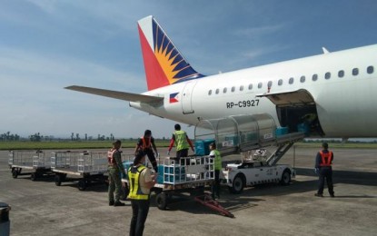 <p><strong>MORE VACCINES</strong>. A total of 23,500 vials of Sinovac’s CoronaVac arrive at the Bacolod-Silay Airport in Negros Occidental aboard a Philippine Airlines flight on Friday (April 30, 2021). Of the number, 16,000 doses will be for Negros Occidental province and 3,000 doses for the City of Bacolod. (<em>Photo courtesy of PDRRMO-Negros Occidental</em>) </p>