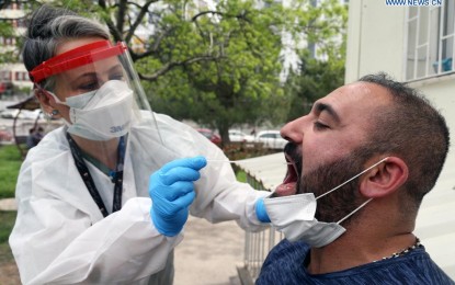 <p><strong>VIRUS TEST.</strong> A medical worker collects a swab sample for a Covid-19 test in Ankara, Turkey, on April 30, 2021. Turkey on Friday reported 31,891 new Covid-19 cases, including 2,673 symptomatic patients, raising the total number in the country to 4,820,591. <em>(Photo by Mustafa Kaya/Xinhua)</em></p>