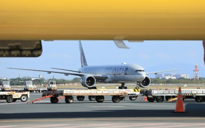 <p><strong>FINALLY IN PH.</strong> Qatar Airways carried 15,000 doses of the Sputnik V Covid-19 vaccines from Moscow and landed at NAIA Terminal 3 in Pasay on Saturday (May 1, 2021). The vaccines were then taken to the PharmaServ Express cold-chain storage facility in Marikina City. <em>(PNA photo by Robert Oswald P. Alfiler)</em></p>